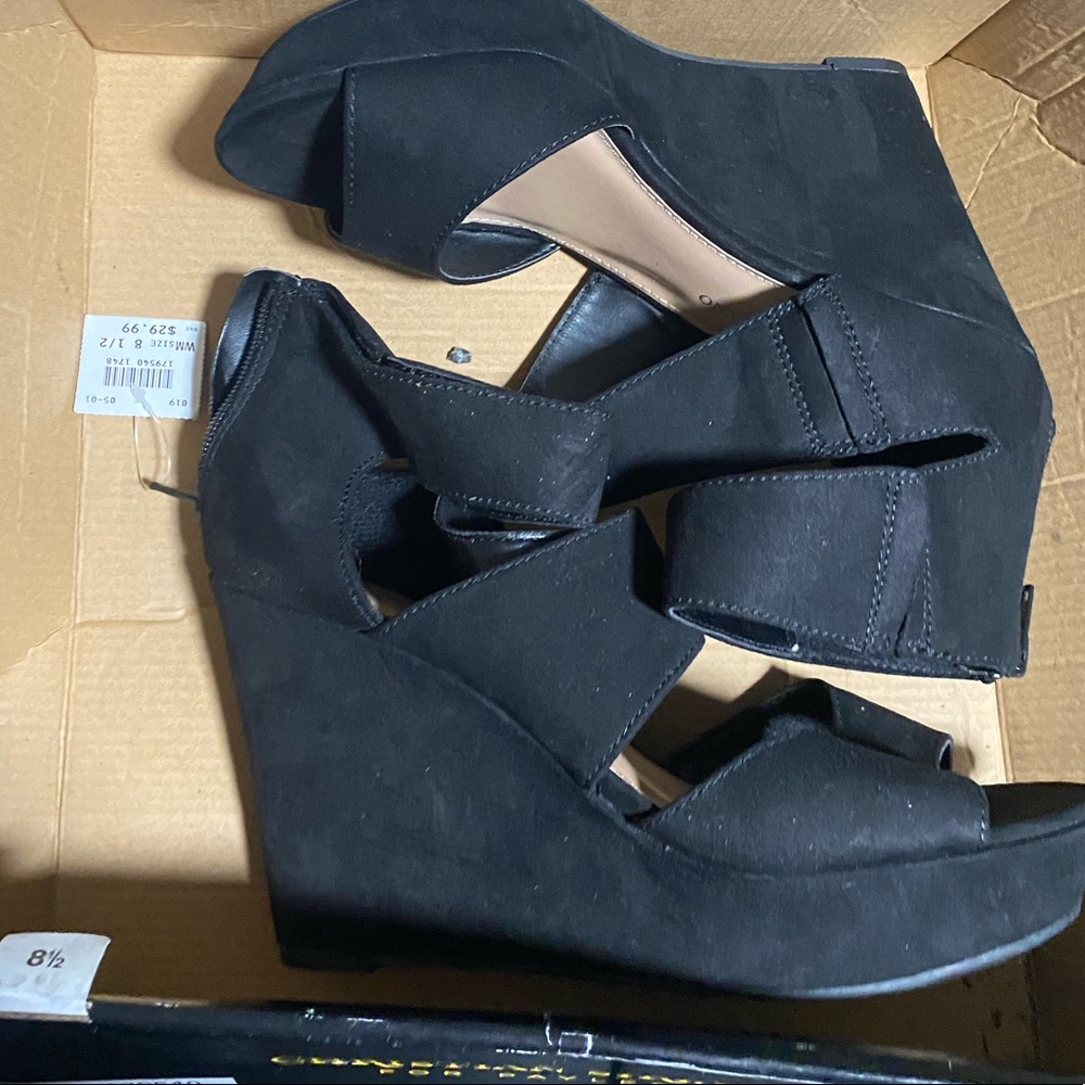 Black wedges never worn or used with tags still attached